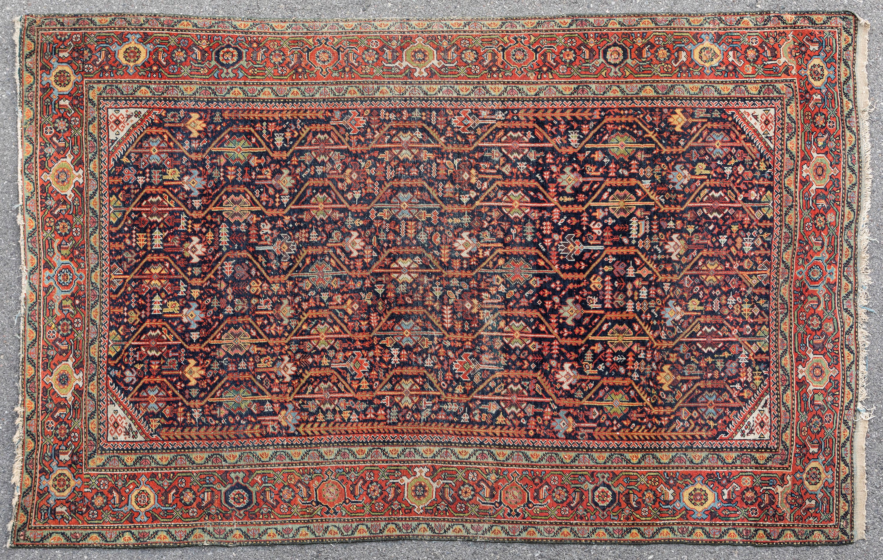 At Auction: Tappeto persiano