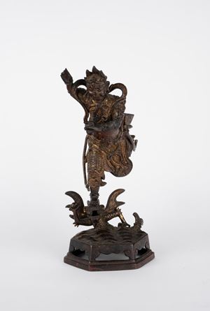 Scultura in bronzo dorato. Cina, secolo XVII