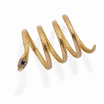 Bracciale serpente in oro giallo 18k con decorazioni in zaffiro e diamanti