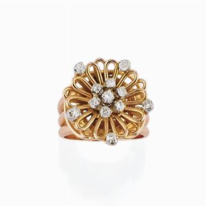 A 18K gold and diamond ring