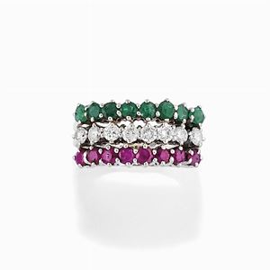 A 18K white gold, emerald, ruby and diamond rings
