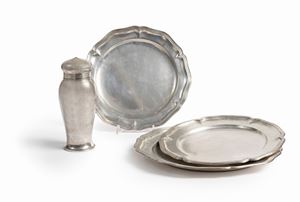 Three silver plates and a shaker