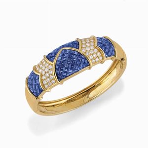 A 18K yellow gold, sapphire and diamond bangle, Chaumet