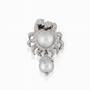 A 18K white gold, cultured pearl and diamond brooch, David Webb
