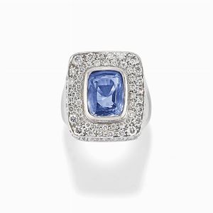 A 18K gold, diamond and sapphire ring