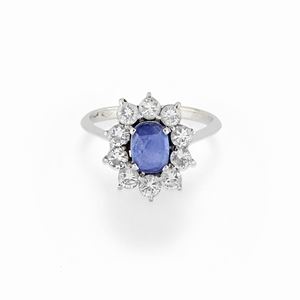 A 18K white gold, sapphire and diamond ring