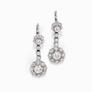 A 18K white gold and diamond earrings