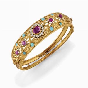 A 18K gold and color stones bracelet