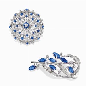 Two 18K white gold, sapphire and diamond brooches