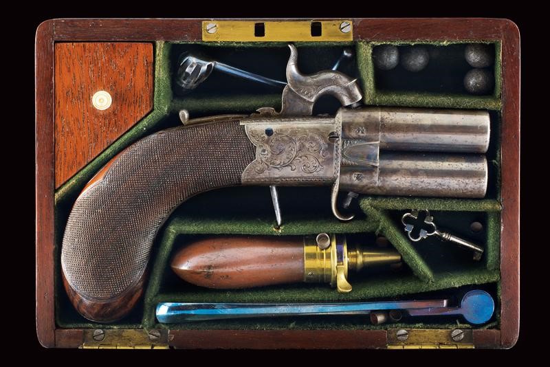 A cased over-and under-barreled percussion pistol by W. Richards Mid ...