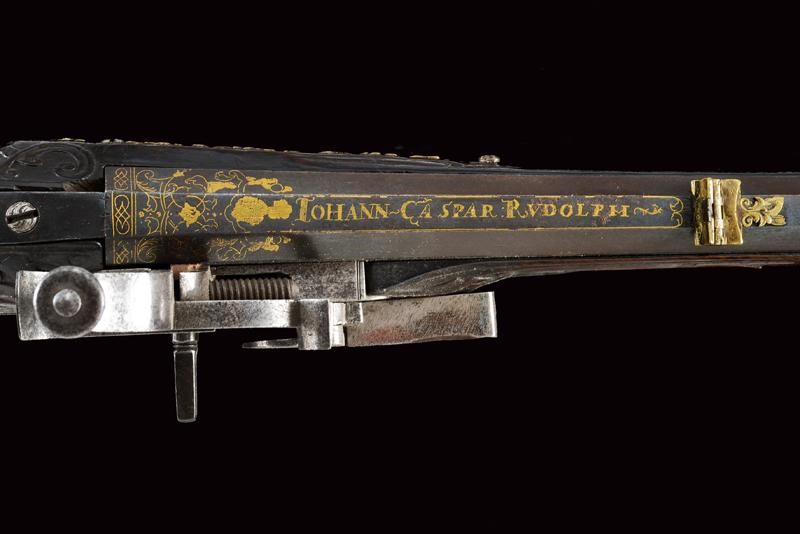 Johann Caspar Rudolph, Fucile a ruota in legno con inciso motivo di caccia