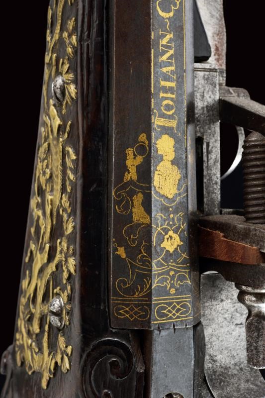 Johann Caspar Rudolph, Fucile a ruota in legno con inciso motivo di caccia