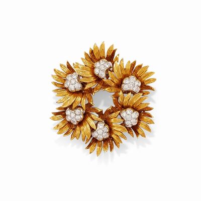 Spilla a ghirlanda in oro bicolore 18k con diamanti