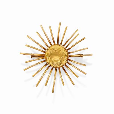 Spilla a fiore in oro giallo 18k con quarzo taglio rotondo