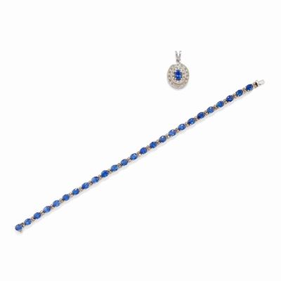 Bracciale tennis in oro bianco 18k con zaffiri ovale e diamanti, pendente con zaffiro ovale incas...