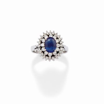 Anello con zaffiro ovale di ct 0,80, in oro bianco 18k
