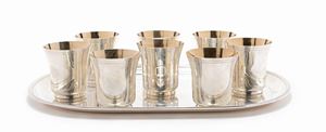 Eight silver glasses and tray