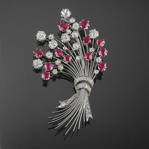 A 18K white gold, ruby and diamond brooch