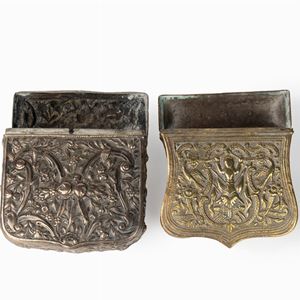 Due cartuccere in metallo decorate a motivi floreali, secolo XIX
