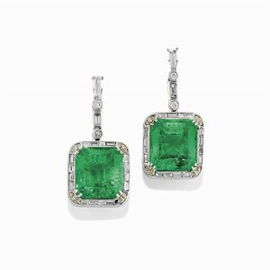 A 18K white gold, emerald and diamond earrings ring