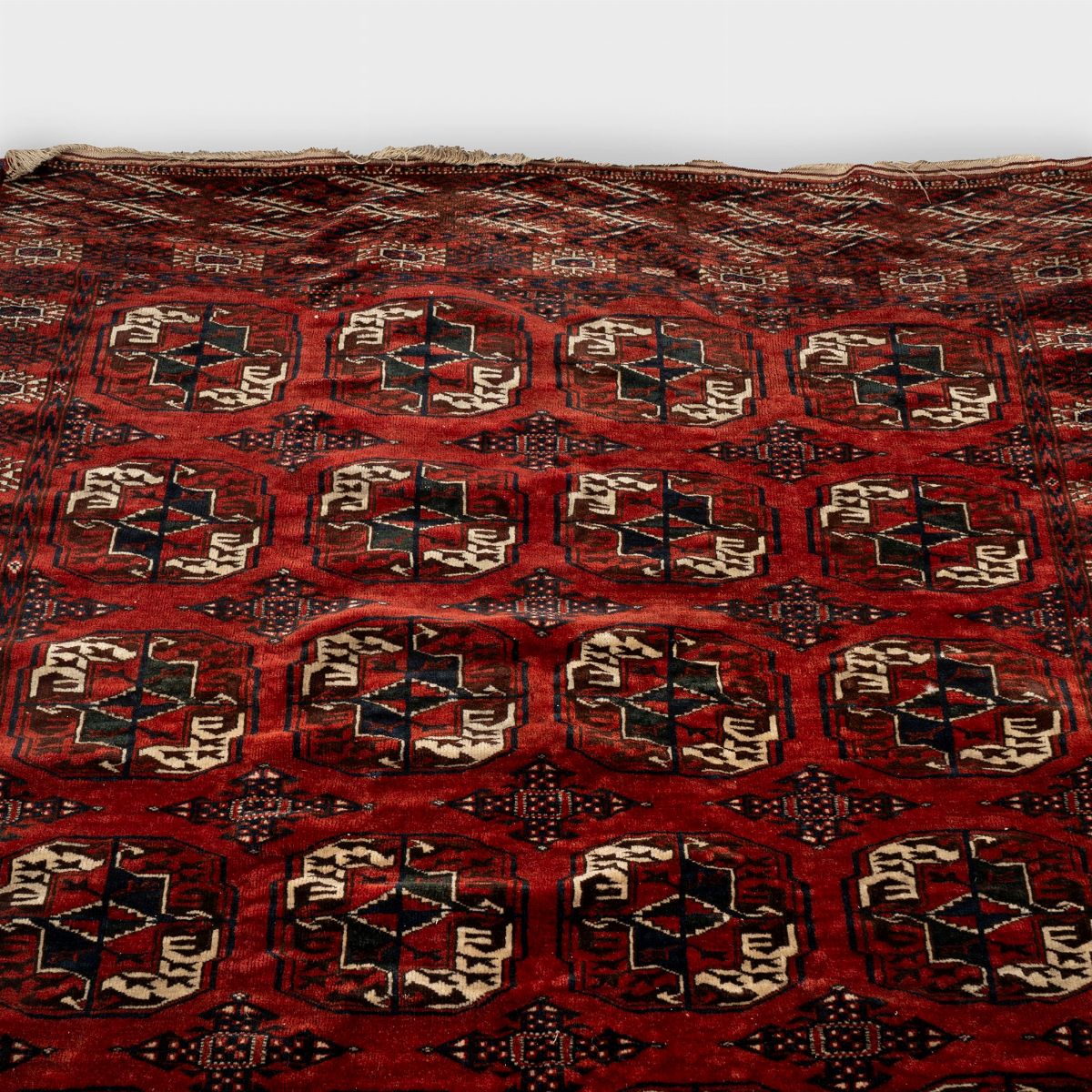 Tappeto Nomade Bukhara Tekke Rosso a Motivi Geometrici, Secolo XX