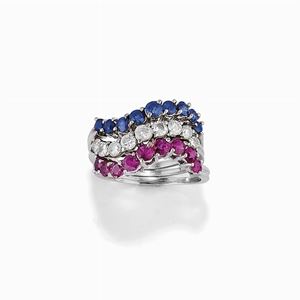 A 18K white gold, diamond, ruby and saphhire three rings