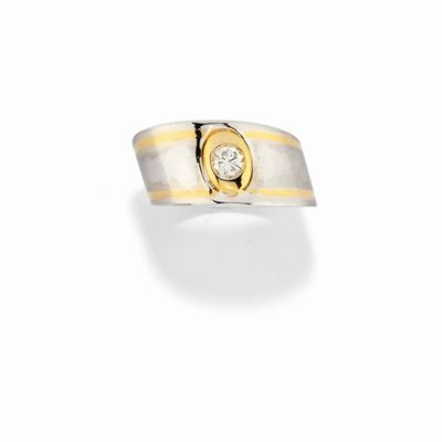 Anello con diamante, platino e oro giallo 18k