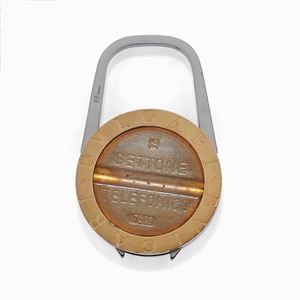 A gold and stell keychain