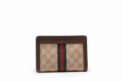 Trousse in tela logata GG con profili in pelle di cinghiale e banda web