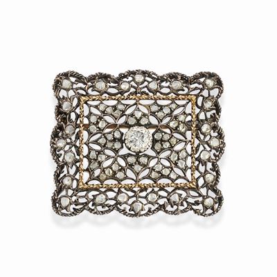 Spilla in oro giallo 18k con diamanti
