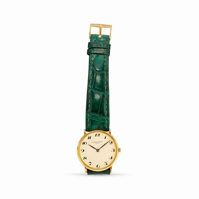 Orologio in oro giallo 18k con quadrante chiaro