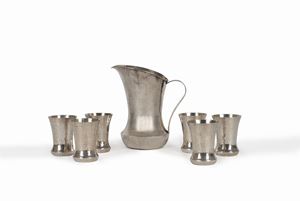 Six sterling silver glasses and a jug