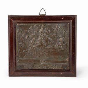 Bronze bas-relief representing the Madonna of Loreto with wooden frame, 20th century