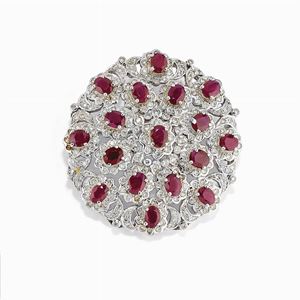 A 18K white gold, diamond and ruby pendant-brooch