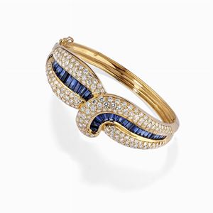 A 18K yellow gold, diamond and sapphire bracelet