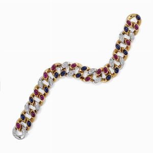 A 18K yellow gold, diamond, ruby and sapphire bracelet