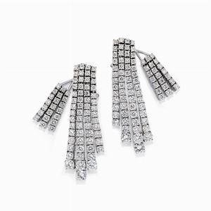 A 18K white gold and diamond earrings 