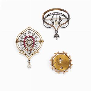 Three silver, low-carat gold, 18K gold, pearl and colored gemstones brooches