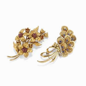 Two 18K yellow gold, ruby, sapphire and diamond brooches, circa 1950