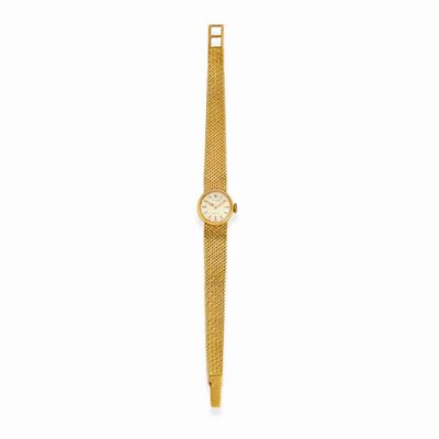 Orologio in oro giallo 18k con quadrante chiaro
