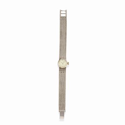 Orologio, cassa in oro bianco 18k con quadrante chiaro e movimento a carica manuale