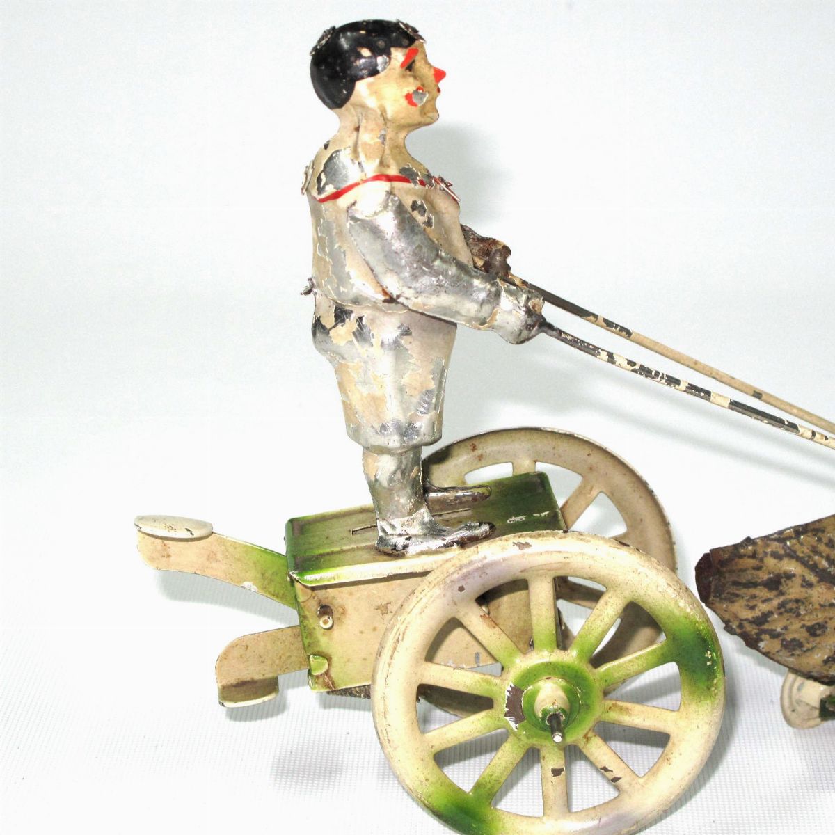 Gunthermann - Giocattolo d'epoca, Clown con cigno in latta dipinta
