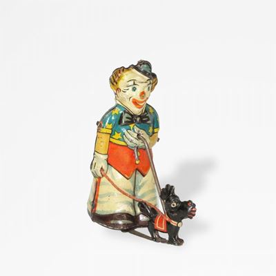 Pagliaccio con cane, giocattolo in latta litografata carica a molla, Germania, 1930