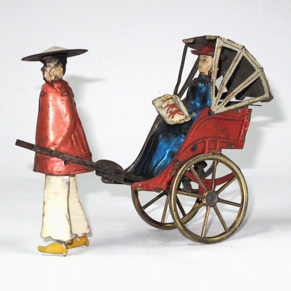 Lehmann - Mikado Family, Giocattolo in latta litografata con movimento a volano, Germania 1910