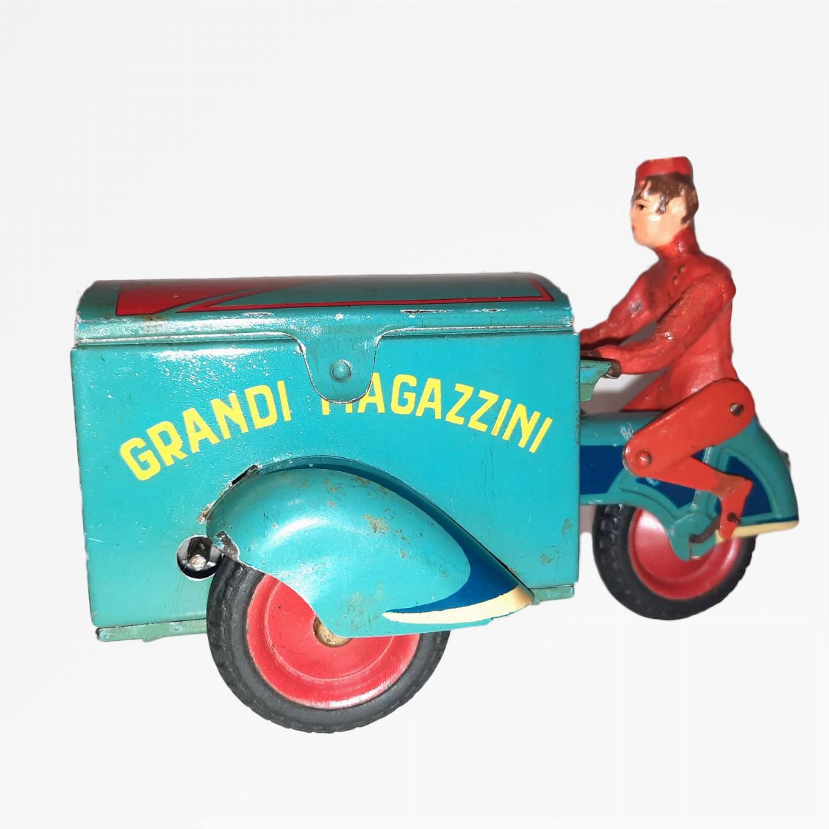 Ingap - Grandi Magazzini, giocattolo in latta litografata con personaggio in pasta, 1935