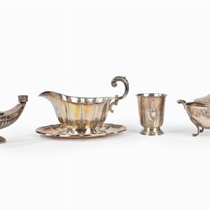 Lotto composto da quattro suppellettili in argento, secolo XX