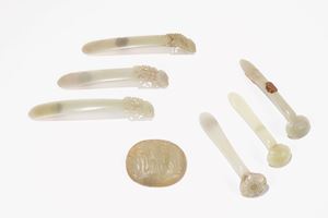 ONE JADE PLAQUE, THREE RUYI SCEPTERS AND THREE PAPERWEIGHTS