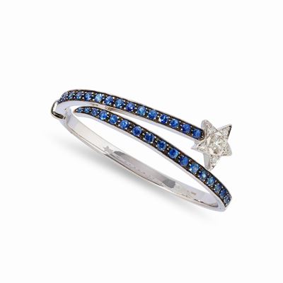 Bracciale a motivi stellari in oro bianco e brunito 18k con zaffiri e diamanti