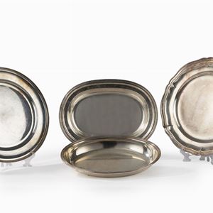 Four silver serving plates, 20th century