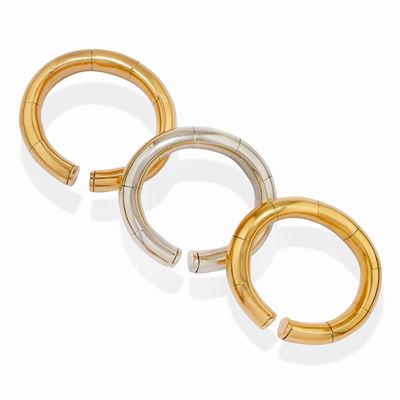 Tre bracciali, oro bicolore 18k